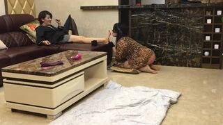 Asian mature woman in stockings humiliates crossdresser lying on the floor